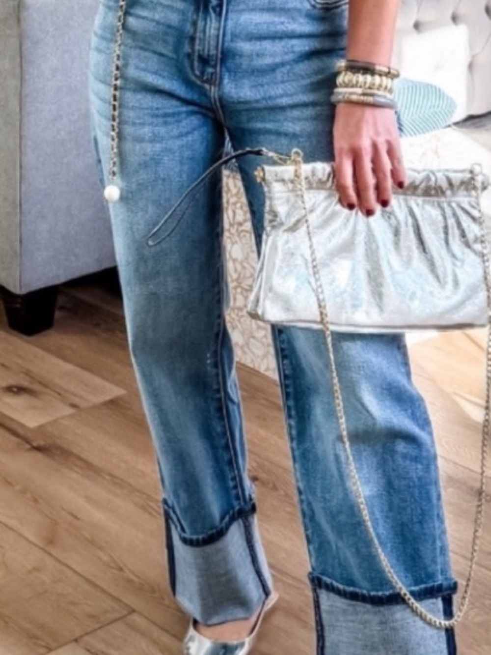Silver clutch with gold chain for shoulder strap